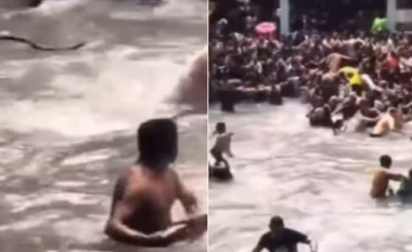 Turistët ikin e bërtasin nga panika pasi një gjarpër bie në ujin ku ata po laheshin